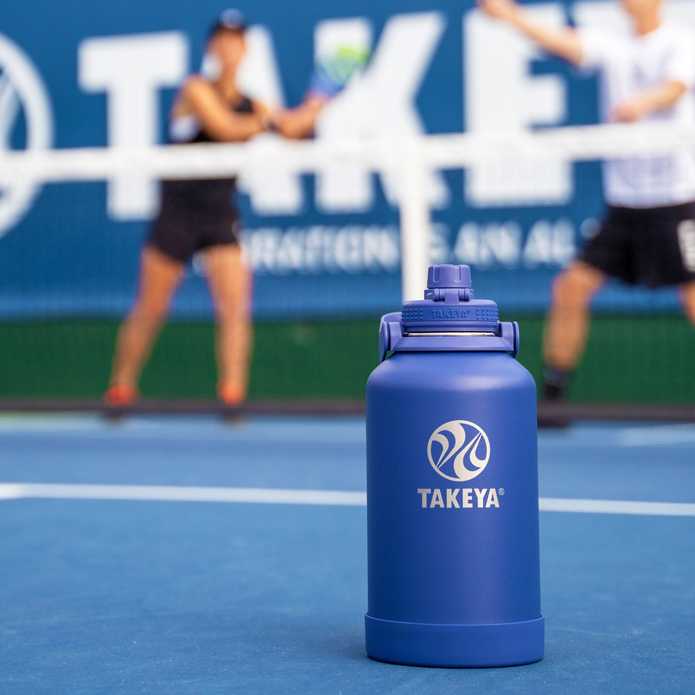 Takeya Newman Pickleball Series Insulated 64 oz. Water Bottle with Sport Spout Lid, Rally Blue